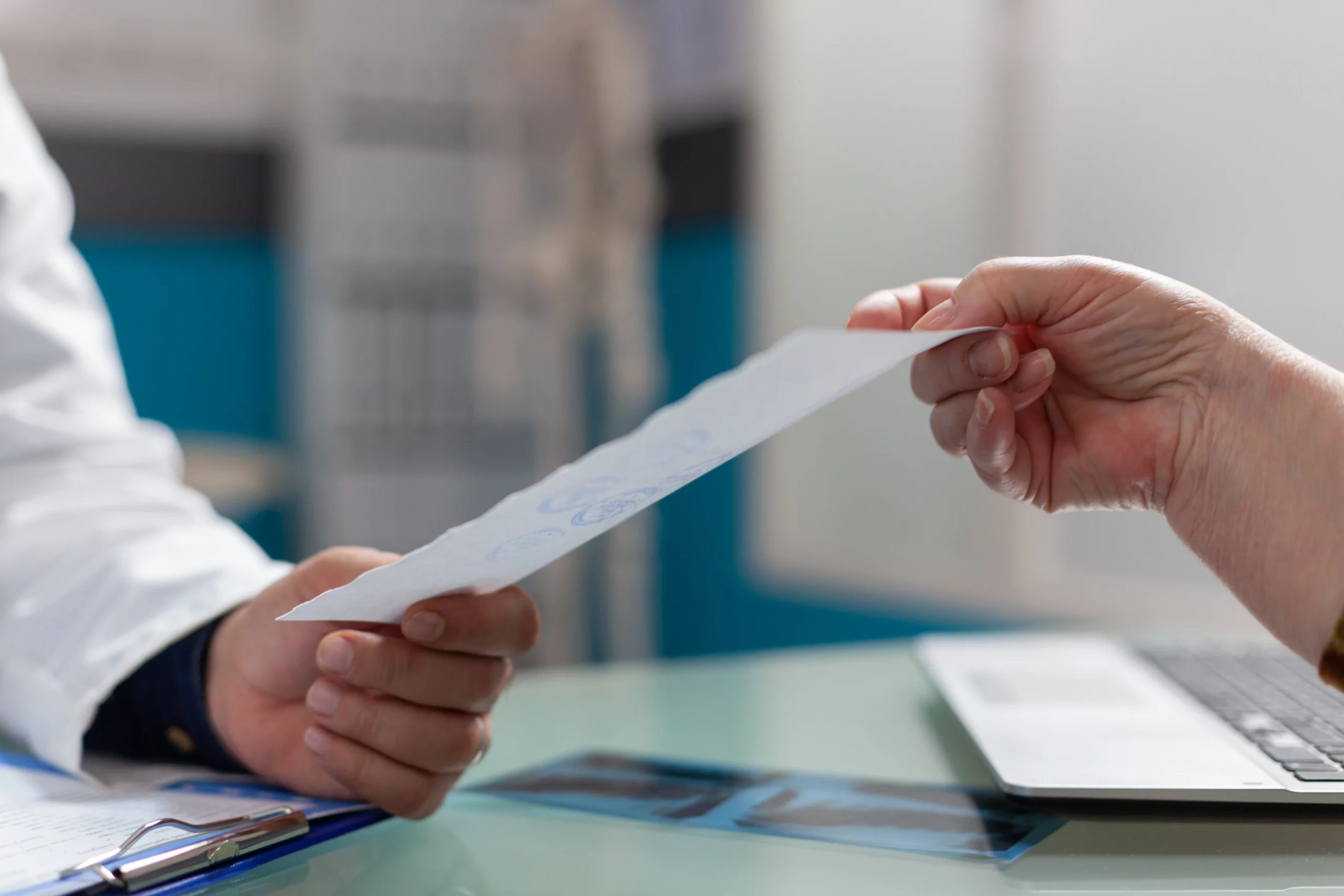 physician giving prescription document patient cabinet after medical consultation medic holding checkup report give treatment retired person health care office close up